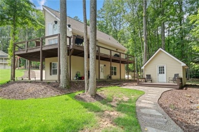Lake Access and Private Dock! This Charming Lakeside Retreat is on The Highlands Course at Lake Arrowhead in Georgia - for sale on GolfHomes.com, golf home, golf lot