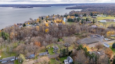 Located just a short walk from the serene waters of Sodus Bay on Sodus Bay Heights Golf Club in New York - for sale on GolfHomes.com, golf home, golf lot