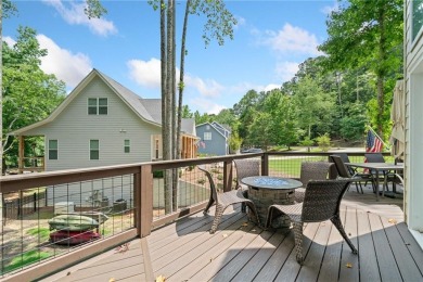 Lake Access and Private Dock! This Charming Lakeside Retreat is on The Highlands Course at Lake Arrowhead in Georgia - for sale on GolfHomes.com, golf home, golf lot