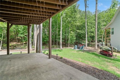 Lake Access and Private Dock! This Charming Lakeside Retreat is on The Highlands Course at Lake Arrowhead in Georgia - for sale on GolfHomes.com, golf home, golf lot