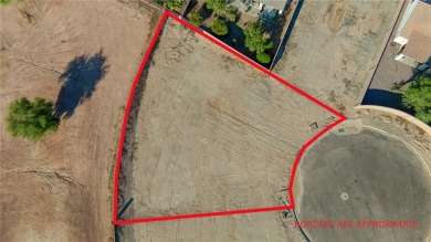 Build your dream home on this large cul de sac lot located on on El Rio Golf and Country Club in Arizona - for sale on GolfHomes.com, golf home, golf lot