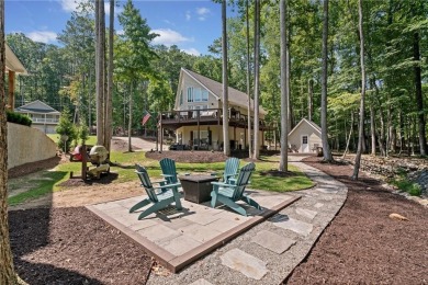 Lake Access and Private Dock! This Charming Lakeside Retreat is on The Highlands Course at Lake Arrowhead in Georgia - for sale on GolfHomes.com, golf home, golf lot