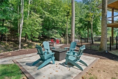 Lake Access and Private Dock! This Charming Lakeside Retreat is on The Highlands Course at Lake Arrowhead in Georgia - for sale on GolfHomes.com, golf home, golf lot