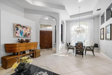 Paradise and a FULL GOLF MEMBERSHIP await you at 138 Isle Drive! on BallenIsles Golf and Country Club in Florida - for sale on GolfHomes.com, golf home, golf lot