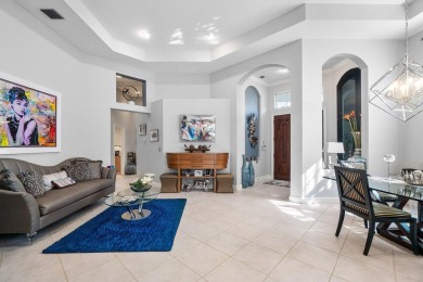 Paradise and a FULL GOLF MEMBERSHIP await you at 138 Isle Drive! on BallenIsles Golf and Country Club in Florida - for sale on GolfHomes.com, golf home, golf lot