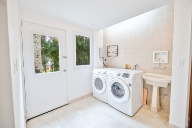 Luxury Golf Villa with Canal and City Skyline Views

Residential on  in  - for sale on GolfHomes.com, golf home, golf lot