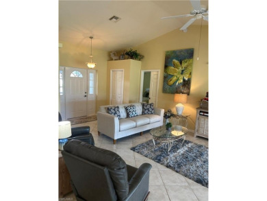 Step into this open and airy 3 bedroom home in Riviera Golf on Riviera Golf Club in Florida - for sale on GolfHomes.com, golf home, golf lot