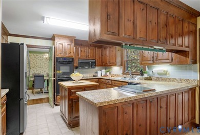 Incredible opportunity to own a beautiful Tudor-style home in on Salisbury Country Club in Virginia - for sale on GolfHomes.com, golf home, golf lot