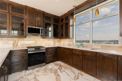 Experience luxury high-rise living in this stunning 4-bedroom on Cascades Golf Club in Texas - for sale on GolfHomes.com, golf home, golf lot