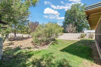 OWNED SOLAR PANELS, MINUTES AWAY FROM UNM, AND UPDATED! Welcome on North Course - University of New Mexico  in New Mexico - for sale on GolfHomes.com, golf home, golf lot