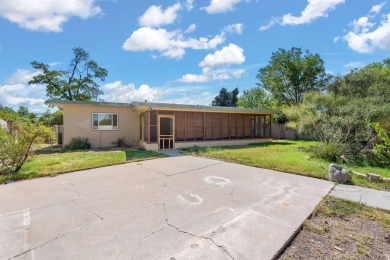 OWNED SOLAR PANELS, MINUTES AWAY FROM UNM, AND UPDATED! Welcome on North Course - University of New Mexico  in New Mexico - for sale on GolfHomes.com, golf home, golf lot