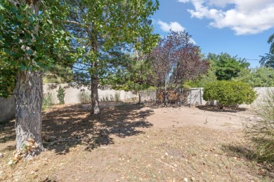 OWNED SOLAR PANELS, MINUTES AWAY FROM UNM, AND UPDATED! Welcome on North Course - University of New Mexico  in New Mexico - for sale on GolfHomes.com, golf home, golf lot