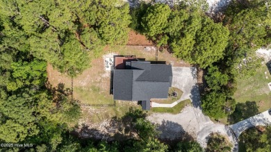 Welcome to 609 Birdie Lane, a stunning retreat tucked away at on The Lakes Country Club in North Carolina - for sale on GolfHomes.com, golf home, golf lot