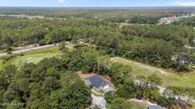 Welcome to 609 Birdie Lane, a stunning retreat tucked away at on The Lakes Country Club in North Carolina - for sale on GolfHomes.com, golf home, golf lot