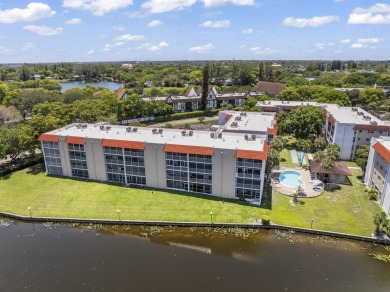 Beautiful & Bright 2-Bedroom, 2-Bath Condo with Serene Canal on Inverrary Country Club in Florida - for sale on GolfHomes.com, golf home, golf lot