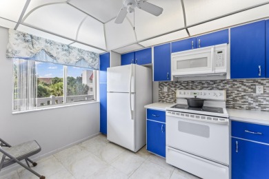 Beautiful & Bright 2-Bedroom, 2-Bath Condo with Serene Canal on Inverrary Country Club in Florida - for sale on GolfHomes.com, golf home, golf lot