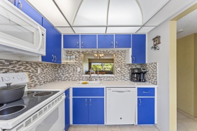 Beautiful & Bright 2-Bedroom, 2-Bath Condo with Serene Canal on Inverrary Country Club in Florida - for sale on GolfHomes.com, golf home, golf lot