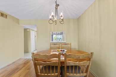 Beautiful & Bright 2-Bedroom, 2-Bath Condo with Serene Canal on Inverrary Country Club in Florida - for sale on GolfHomes.com, golf home, golf lot