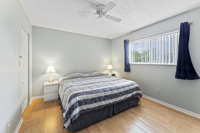 Beautiful & Bright 2-Bedroom, 2-Bath Condo with Serene Canal on Inverrary Country Club in Florida - for sale on GolfHomes.com, golf home, golf lot