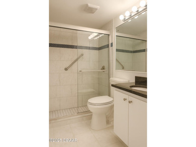 Experience the ultimate oceanfront lifestyle in this beautifully on Oceans Golf Club in Florida - for sale on GolfHomes.com, golf home, golf lot