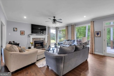 Welcome to this stunning 5 bedroom/4 Bath executive residence on Towne Lake Hills Golf Club in Georgia - for sale on GolfHomes.com, golf home, golf lot