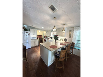 BEAUTIFUL 2 BEDROOM / 2 BATH MOBILE HOME ... READY TO MOVE INTO: on The Meadows At Countrywood in Florida - for sale on GolfHomes.com, golf home, golf lot