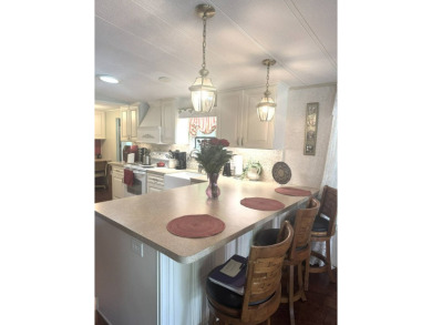 BEAUTIFUL 2 BEDROOM / 2 BATH MOBILE HOME ... READY TO MOVE INTO: on The Meadows At Countrywood in Florida - for sale on GolfHomes.com, golf home, golf lot