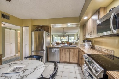 Immaculate 2BR/2BA condo in highly desirable Indian Spring on Indian Spring Golf and Country Club in Florida - for sale on GolfHomes.com, golf home, golf lot