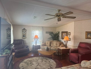 BEAUTIFUL 2 BEDROOM / 2 BATH MOBILE HOME ... READY TO MOVE INTO: on The Meadows At Countrywood in Florida - for sale on GolfHomes.com, golf home, golf lot