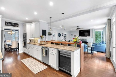 Welcome to this stunning 5 bedroom/4 Bath executive residence on Towne Lake Hills Golf Club in Georgia - for sale on GolfHomes.com, golf home, golf lot