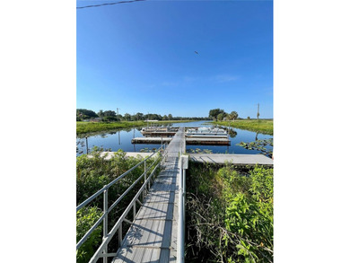 Country Living at its finest on this half acre lot in this gated on Indian Lake Estates Golf and Country Club in Florida - for sale on GolfHomes.com, golf home, golf lot