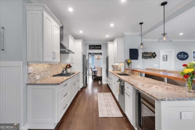 Welcome to this stunning 5 bedroom/4 Bath executive residence on Towne Lake Hills Golf Club in Georgia - for sale on GolfHomes.com, golf home, golf lot