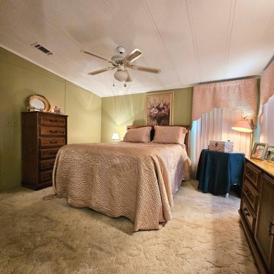 BEAUTIFUL 2 BEDROOM / 2 BATH MOBILE HOME ... READY TO MOVE INTO: on The Meadows At Countrywood in Florida - for sale on GolfHomes.com, golf home, golf lot