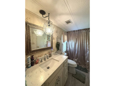 BEAUTIFUL 2 BEDROOM / 2 BATH MOBILE HOME ... READY TO MOVE INTO: on The Meadows At Countrywood in Florida - for sale on GolfHomes.com, golf home, golf lot