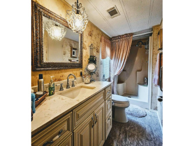 BEAUTIFUL 2 BEDROOM / 2 BATH MOBILE HOME ... READY TO MOVE INTO: on The Meadows At Countrywood in Florida - for sale on GolfHomes.com, golf home, golf lot