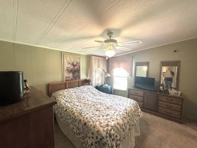 BEAUTIFUL 2 BEDROOM / 2 BATH MOBILE HOME ... READY TO MOVE INTO: on The Meadows At Countrywood in Florida - for sale on GolfHomes.com, golf home, golf lot