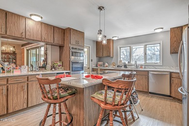 This stunning contemporary ranch is perfectly positioned on 1.71 on Link Hills Country Club in Tennessee - for sale on GolfHomes.com, golf home, golf lot