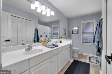 Welcome to this stunning 5 bedroom/4 Bath executive residence on Towne Lake Hills Golf Club in Georgia - for sale on GolfHomes.com, golf home, golf lot