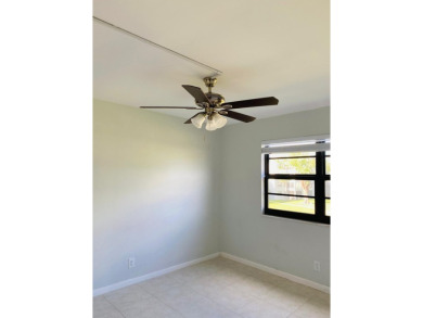 This beautifully remodeled corner unit offers serene views of on Boca Dunes Golf and Country Club in Florida - for sale on GolfHomes.com, golf home, golf lot