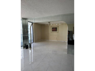 This bright and spacious residence is ideally located on East on Turnberry Isle Resort and Club in Florida - for sale on GolfHomes.com, golf home, golf lot