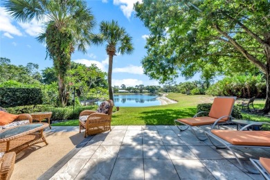 Brand new roof!!!Beautiful lake view villa with private setting on Bent Pine Golf Club in Florida - for sale on GolfHomes.com, golf home, golf lot