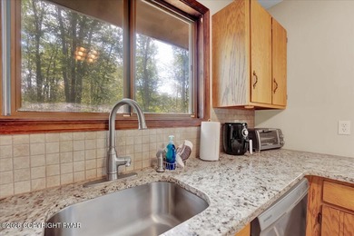 Welcome to your ideal Pocono escape in the heart of Lake Naomi on Lake Naomi Timber Trails Golf Club in Pennsylvania - for sale on GolfHomes.com, golf home, golf lot