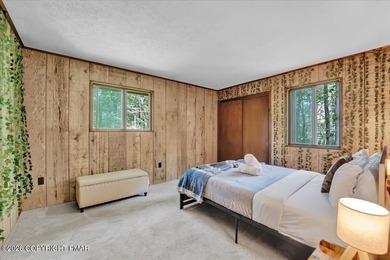 Welcome to your ideal Pocono escape in the heart of Lake Naomi on Lake Naomi Timber Trails Golf Club in Pennsylvania - for sale on GolfHomes.com, golf home, golf lot