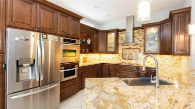 Welcome to 935 Ekana Green Ct, a spacious and beautifully on Twin Rivers Golf Club in Florida - for sale on GolfHomes.com, golf home, golf lot