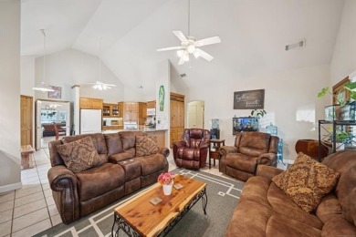 Enjoy the sunset from the back patio overlooking the 18th hole on Battle Creek Golf Course in Oklahoma - for sale on GolfHomes.com, golf home, golf lot