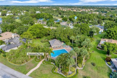 Brand new roof!!!Beautiful lake view villa with private setting on Bent Pine Golf Club in Florida - for sale on GolfHomes.com, golf home, golf lot