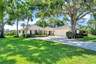 Brand new roof!!!Beautiful lake view villa with private setting on Bent Pine Golf Club in Florida - for sale on GolfHomes.com, golf home, golf lot