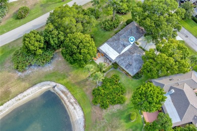 Brand new roof!!!Beautiful lake view villa with private setting on Bent Pine Golf Club in Florida - for sale on GolfHomes.com, golf home, golf lot