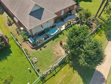 Enjoy the sunset from the back patio overlooking the 18th hole on Battle Creek Golf Course in Oklahoma - for sale on GolfHomes.com, golf home, golf lot