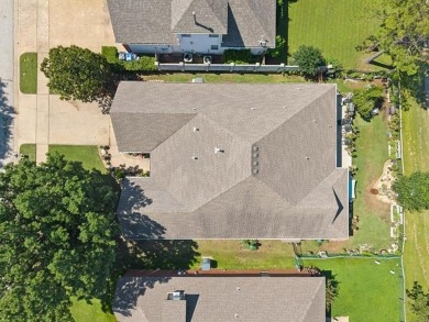 Enjoy the sunset from the back patio overlooking the 18th hole on Battle Creek Golf Course in Oklahoma - for sale on GolfHomes.com, golf home, golf lot